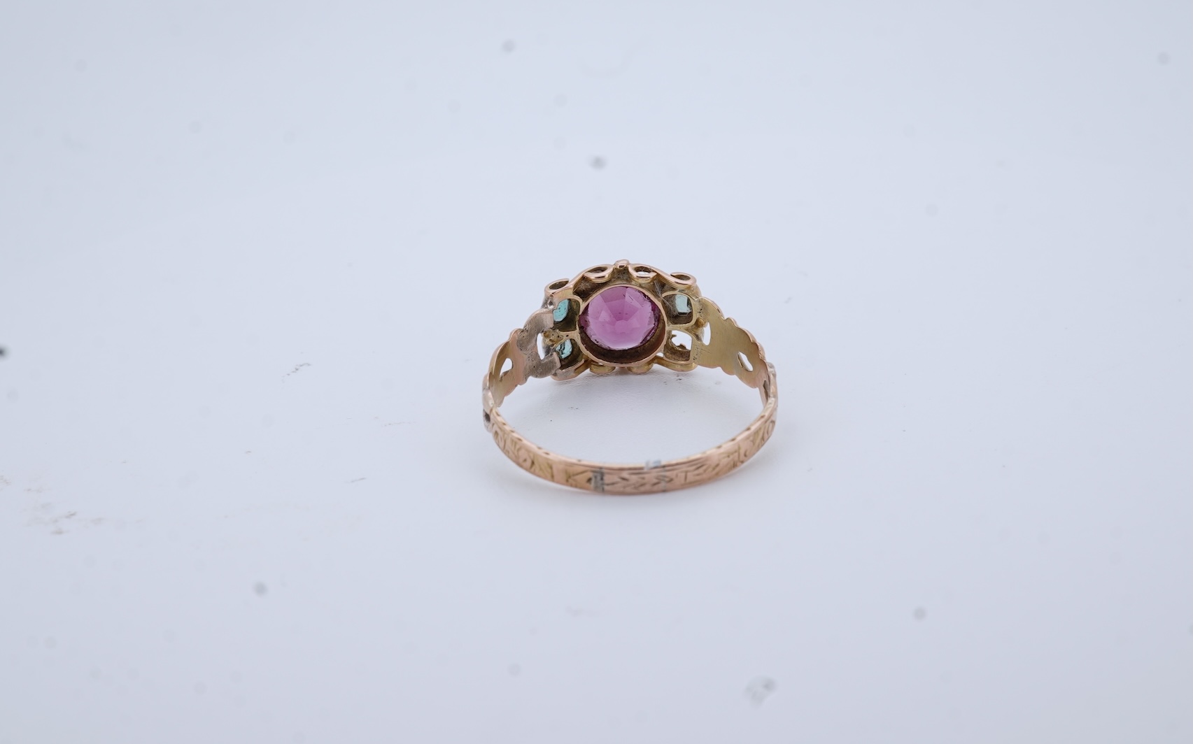 A Victorian garnet and paste ring, circa 1857